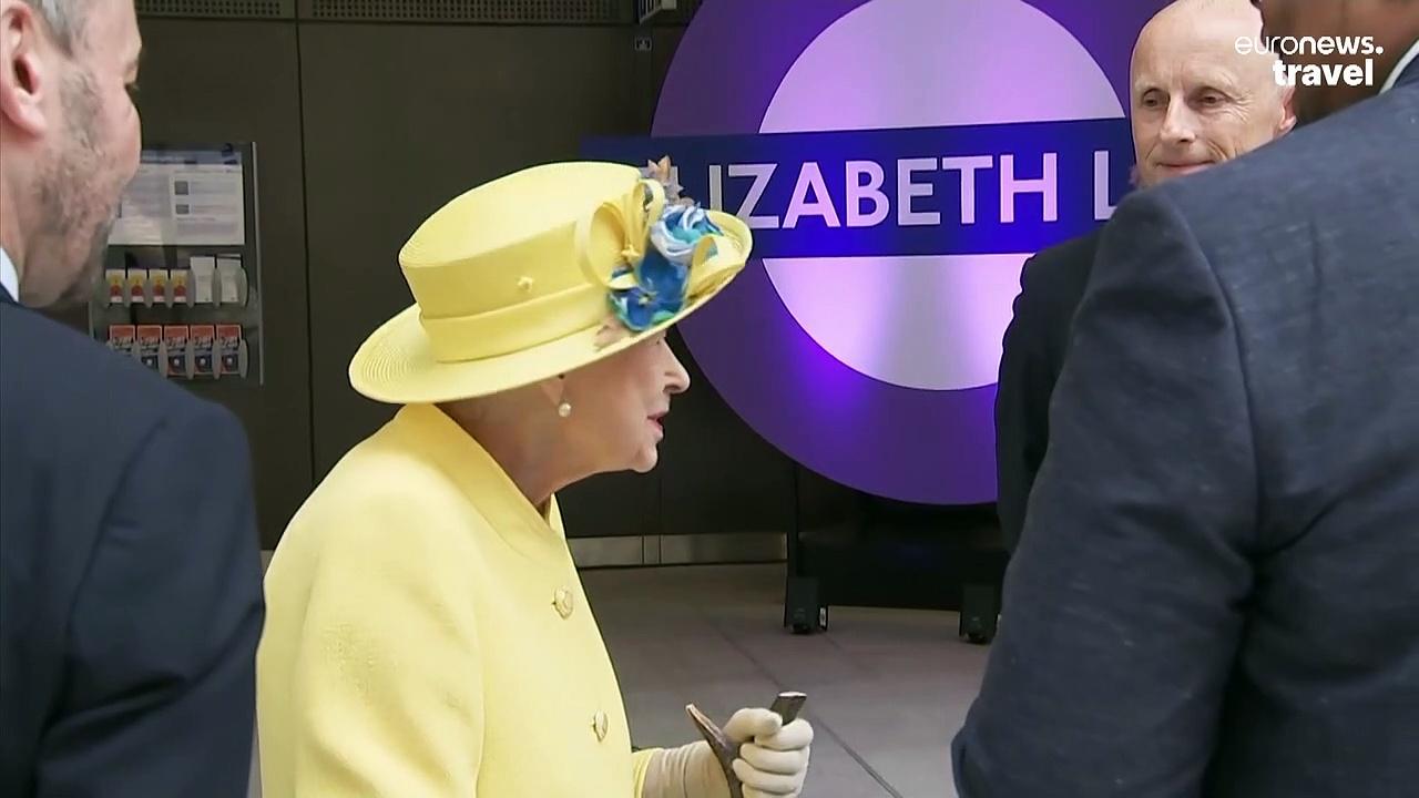 Queen Elizabeth II makes surprise visit to open London's new rail line
