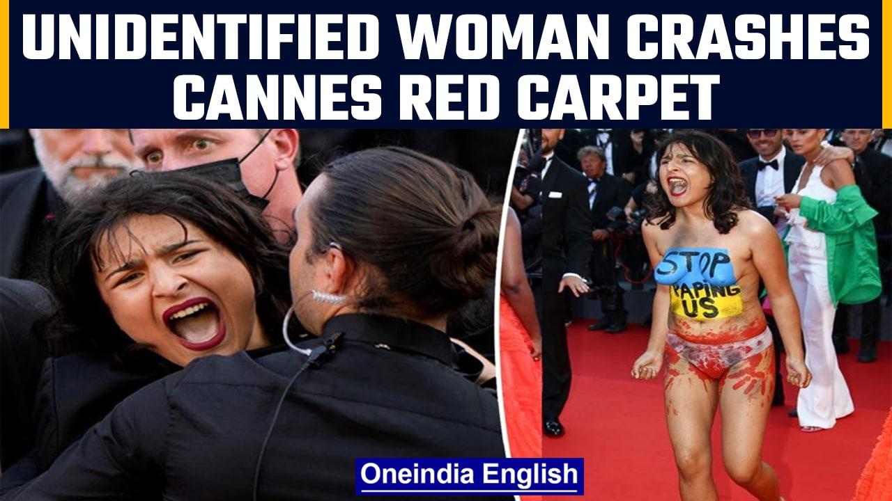 Cannes red carpet crashed by a woman, protests against sexualviolence in Ukraine | OneIndia News