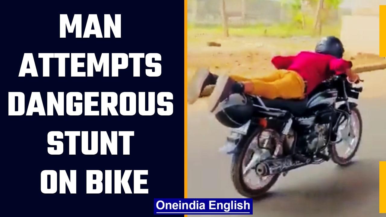 NOIDA : A man performs dangerous stunt on bike, police takes action | Oneindia News