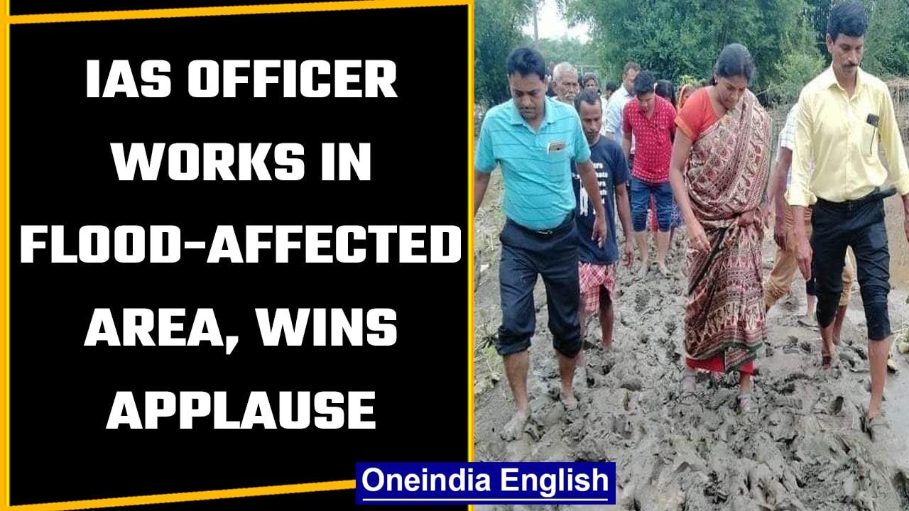 IAS Officer wins applause for working barefoot in flood-affected area of Assam | OneIndia News