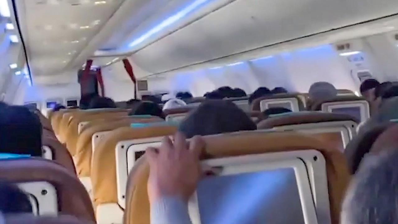 Passengers scream as turbulence rocks plane during nightmare landing