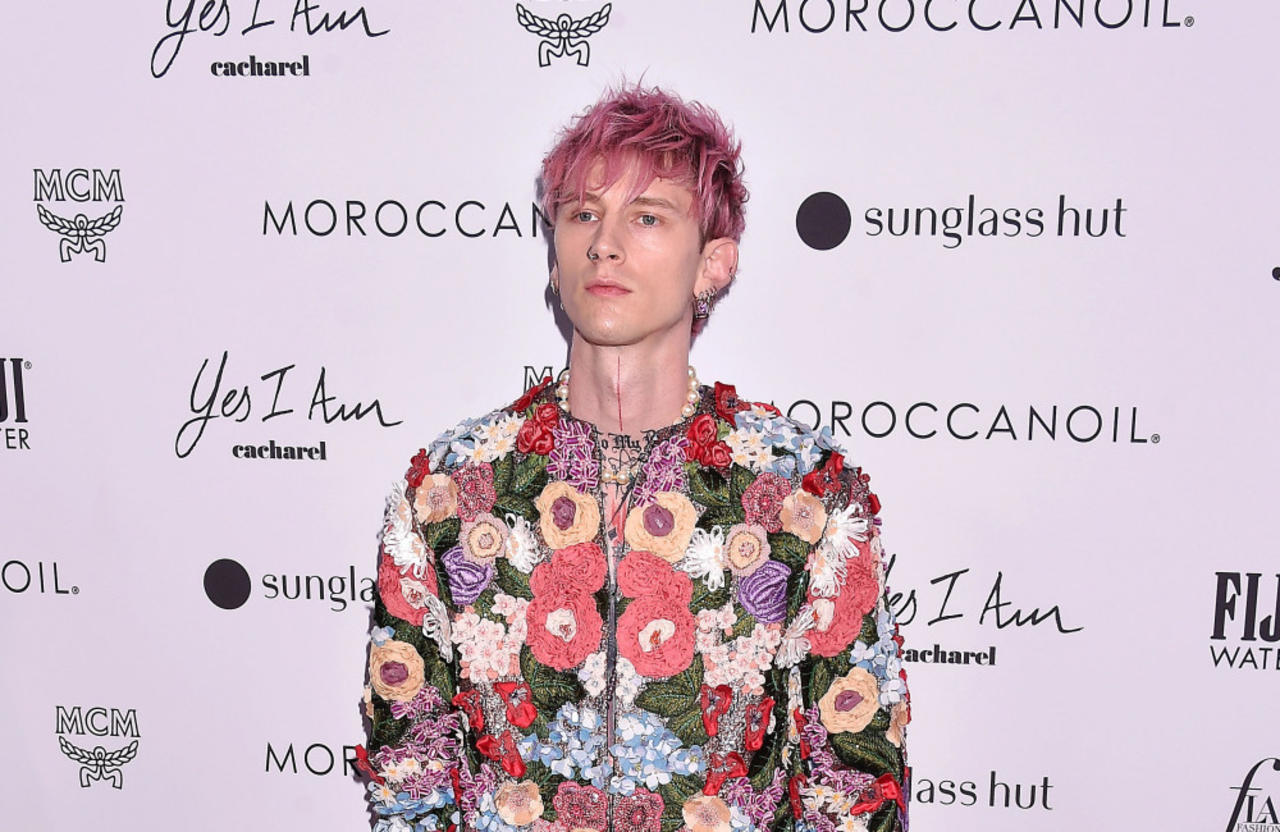 Why did Machine Gun Kelly get in 'trouble' at a bar?