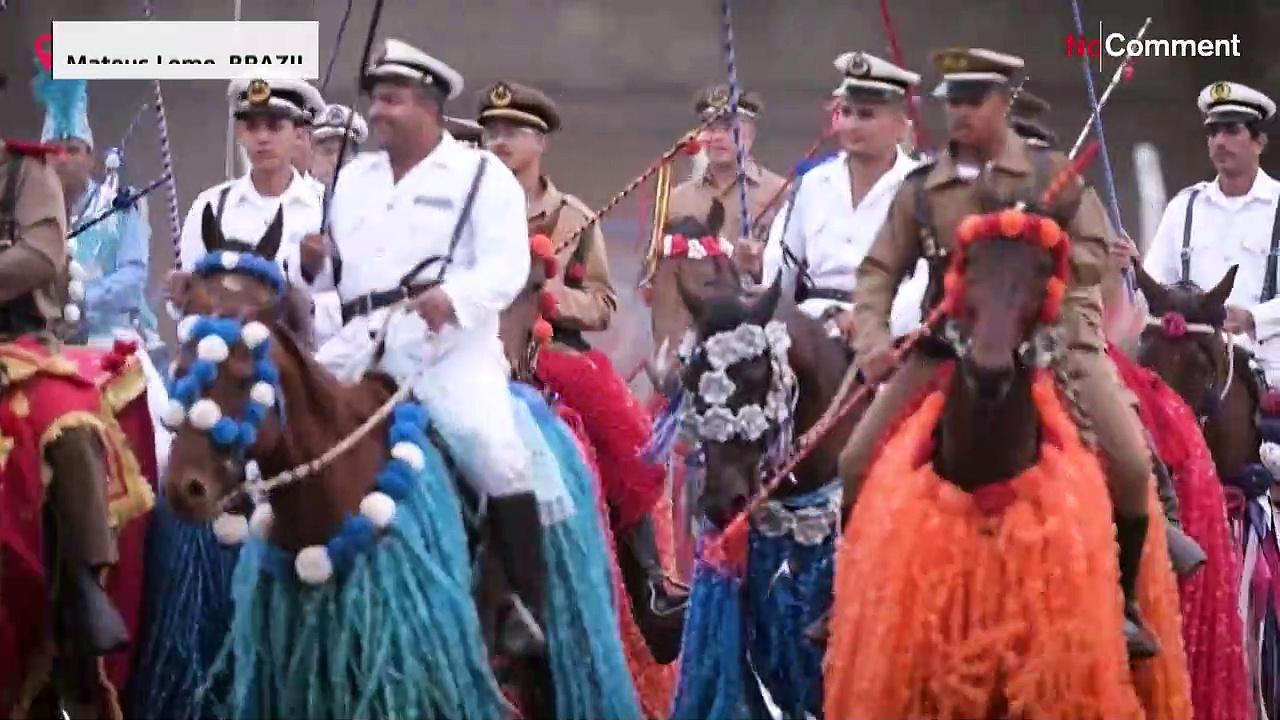 Men riding horses take part in traditional festival Cavalhada in Brazil