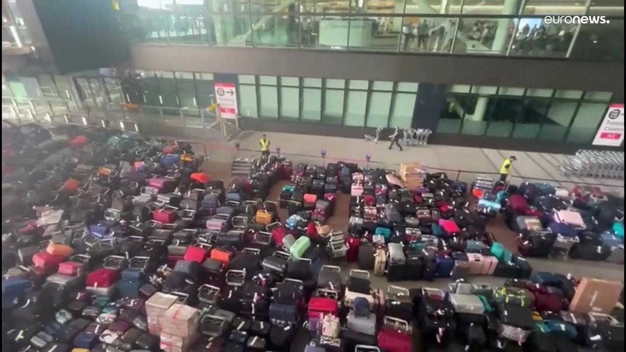 Chaos at Heathrow Airport as a baggage system malfunction causes pile-up