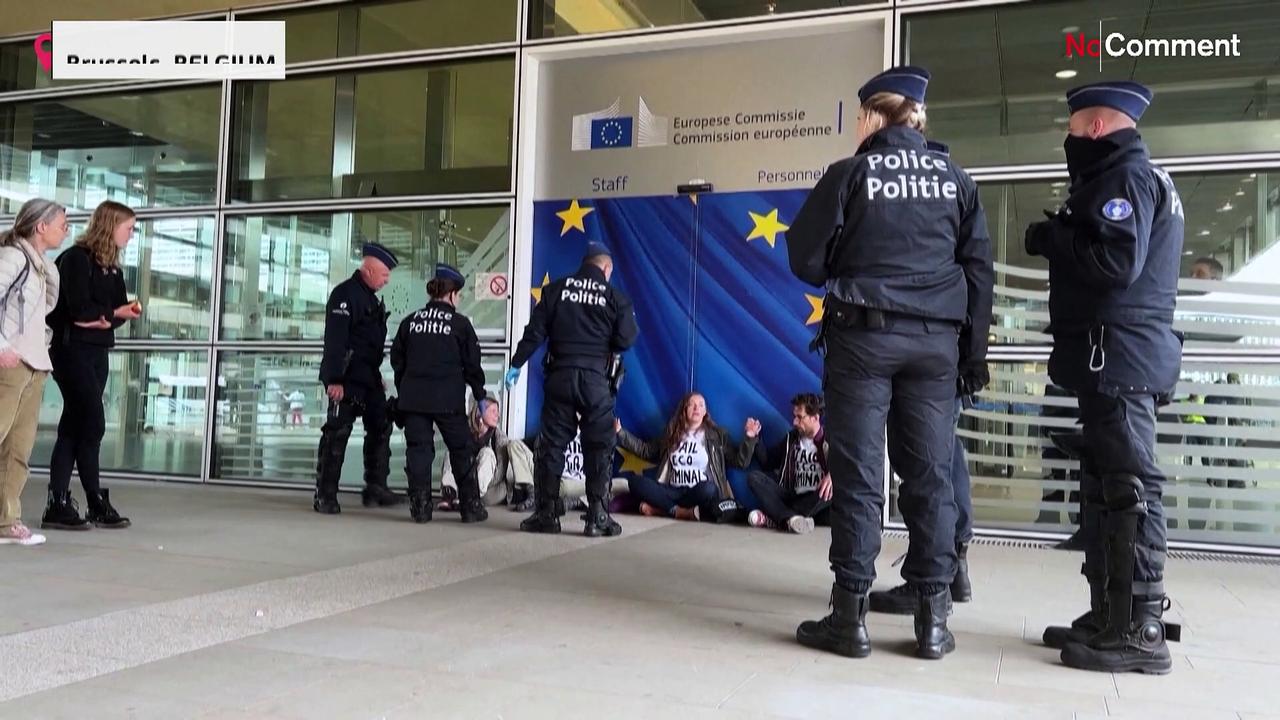 Extinction Rebellion demonstrators protest in front of the European Commission