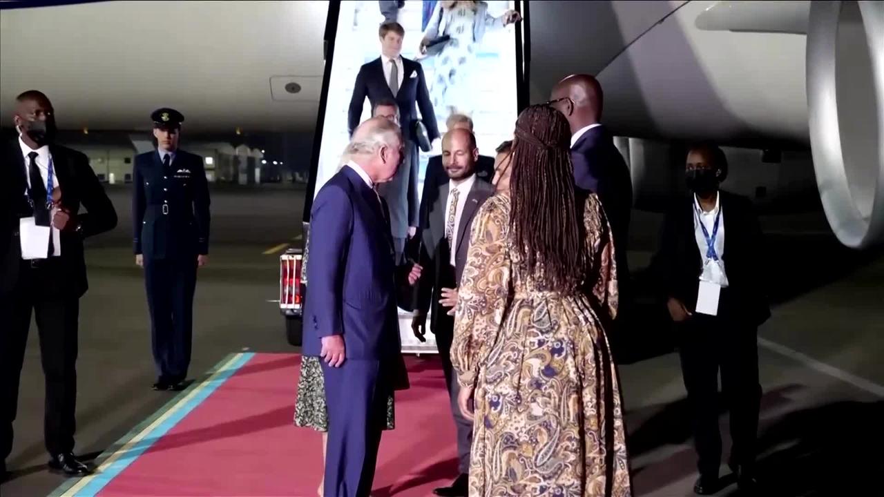 Britain's Prince Charles and Camilla arrive in Rwanda