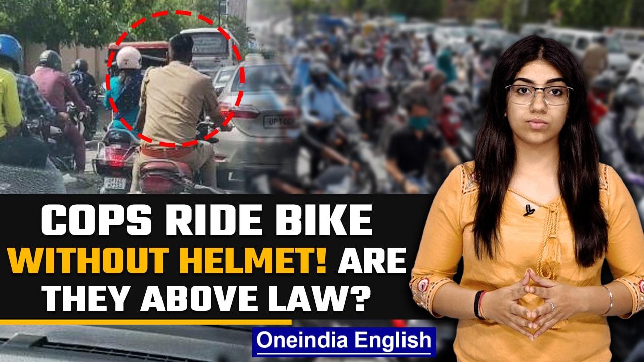 Uttar Pradesh: Cop rides motorcycle without helmet | Cop on motorcycle | Oneindia News *News