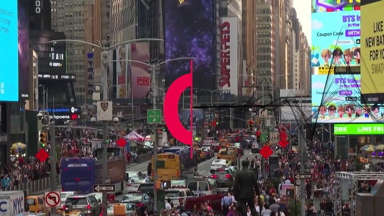 Screens in Times Square display the first images from the James Webb Space Telescope