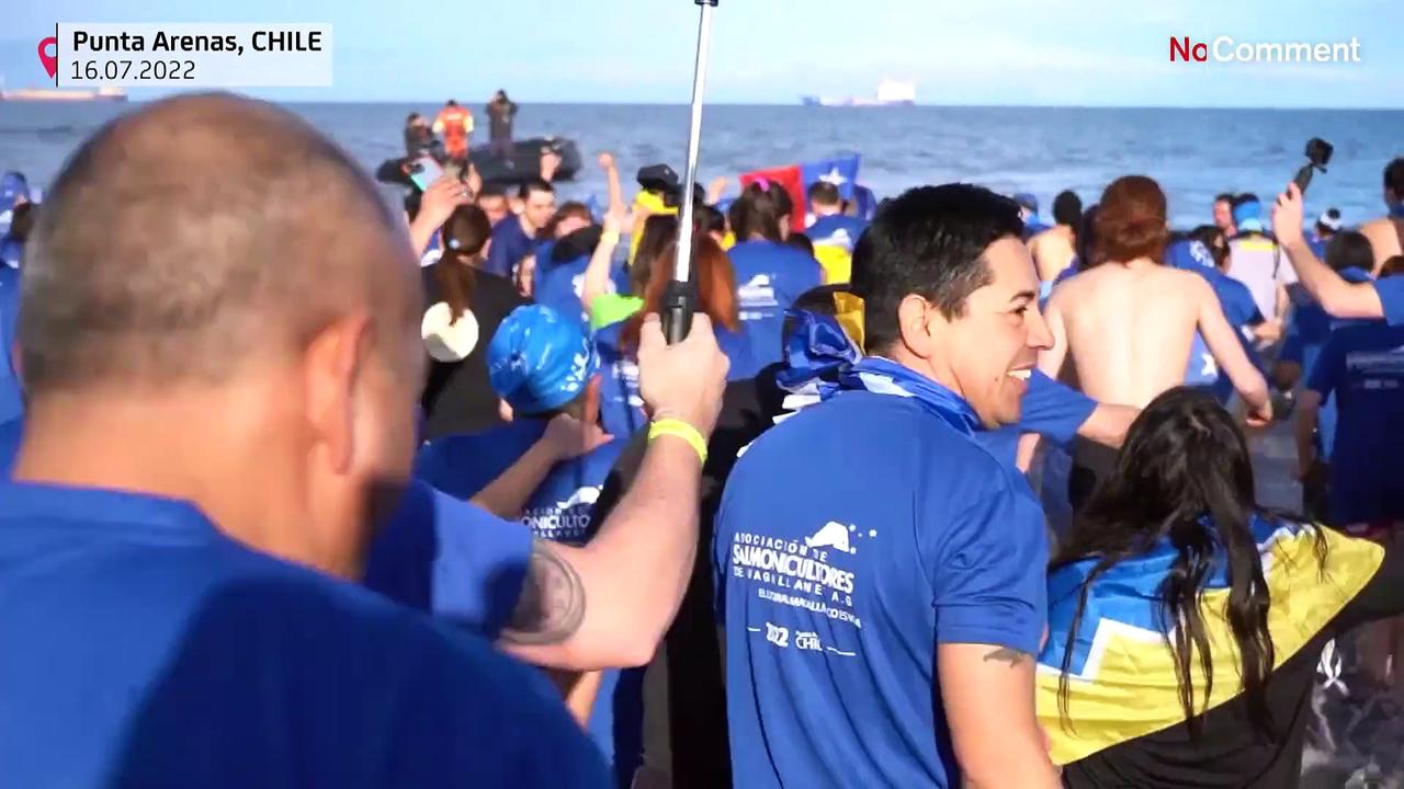 Thousands plunge into cold Magellan Strait waters