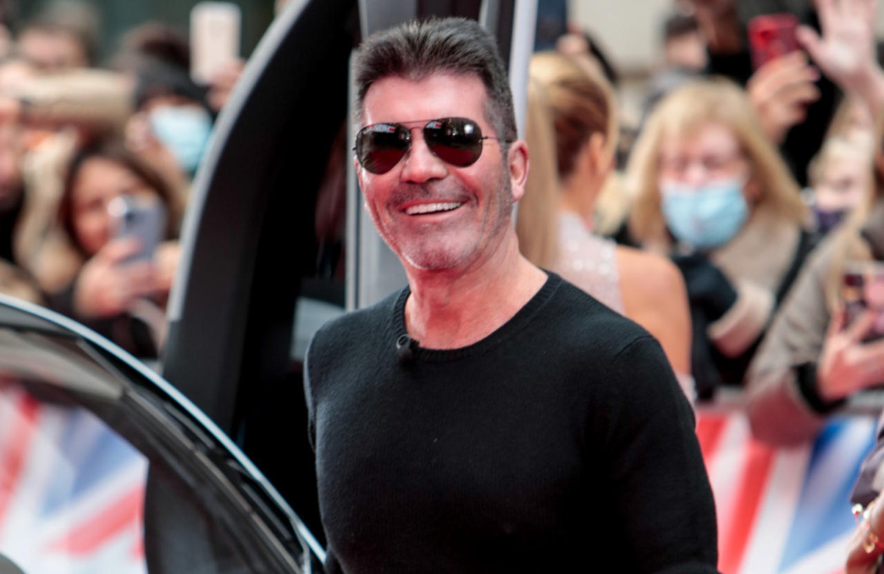 Simon Cowell signs with talent management agency YMU