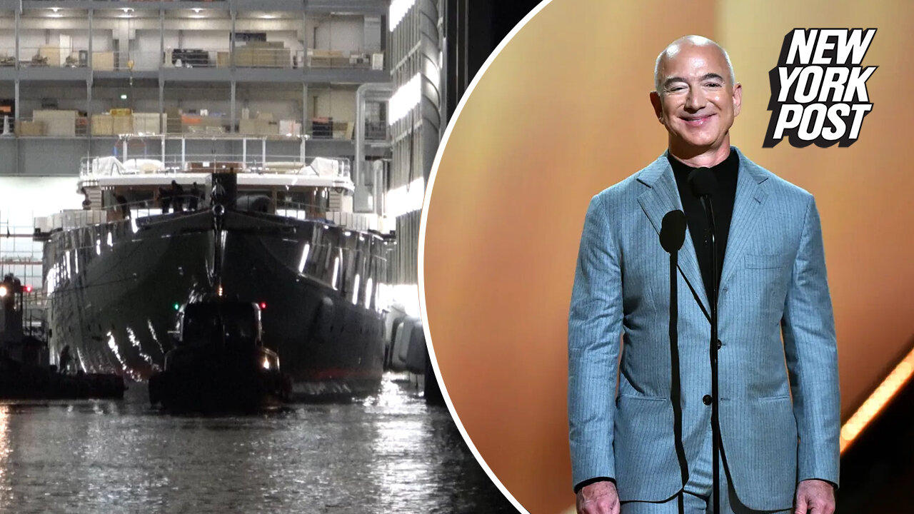 Jeff Bezos' unfinished mega yacht towed away from Dutch port in dead of night