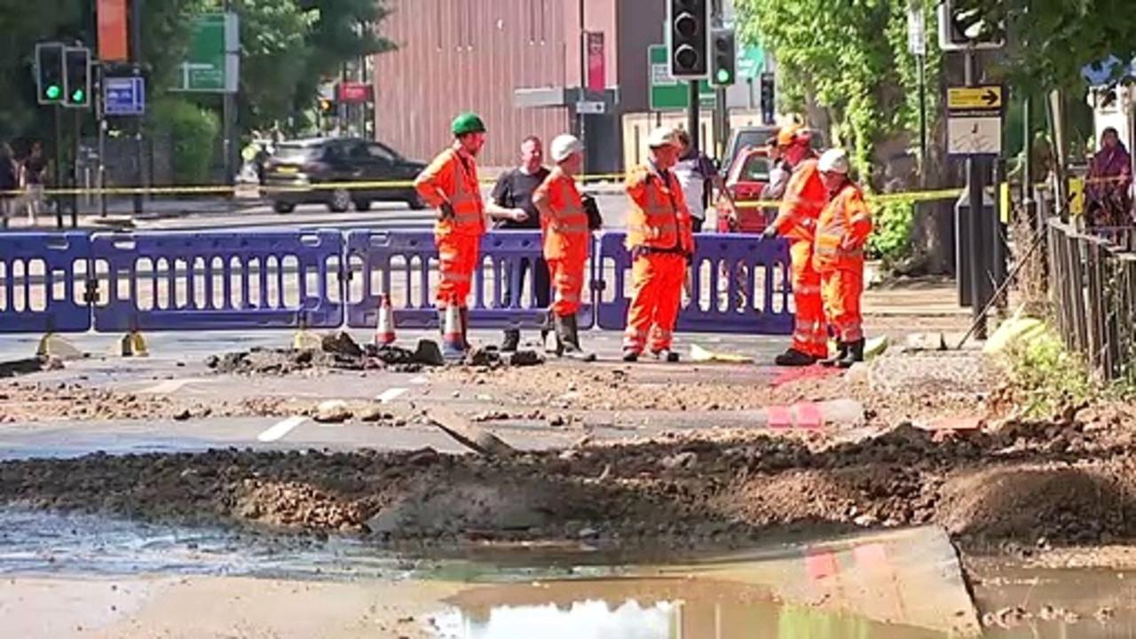 Burst water main causes flooding in north London
