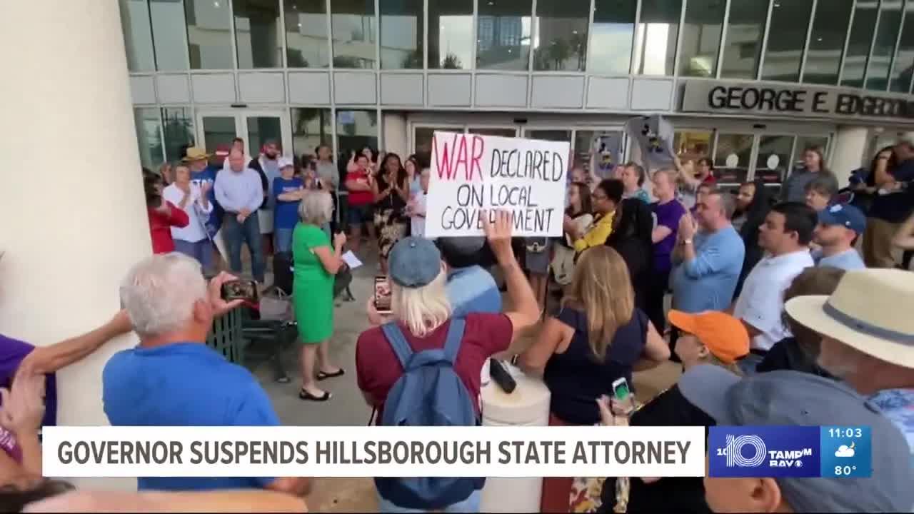 Demonstrators gather outside Hillsborough County Courthouse in support of Andrew Warren