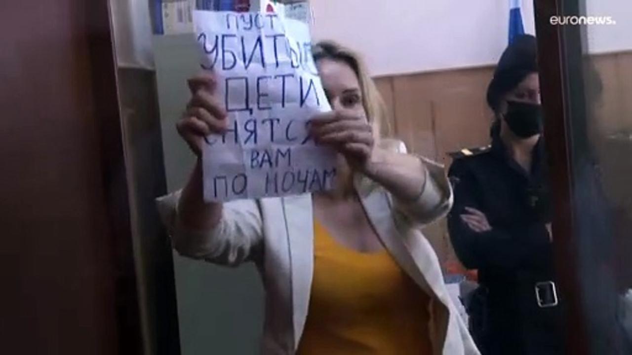 'May the dead children haunt you': Defiant Russian journalist in court