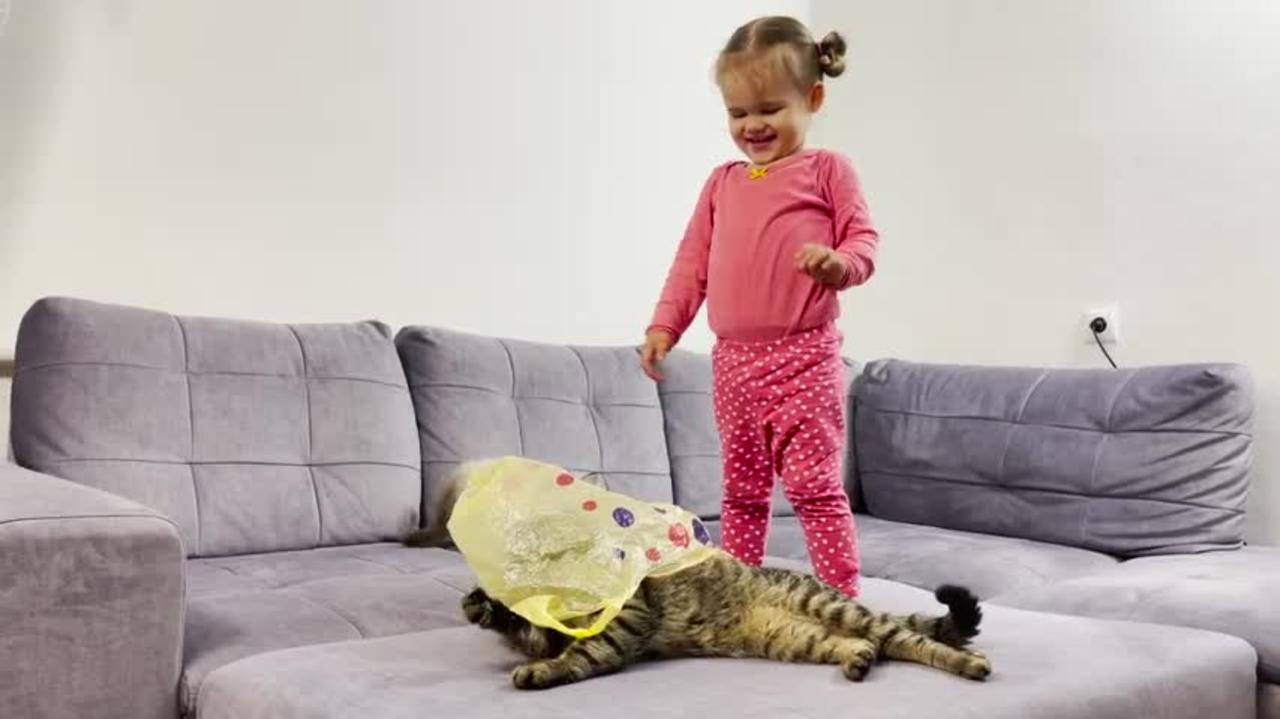 Adorable_Baby_Playing_With_Cats