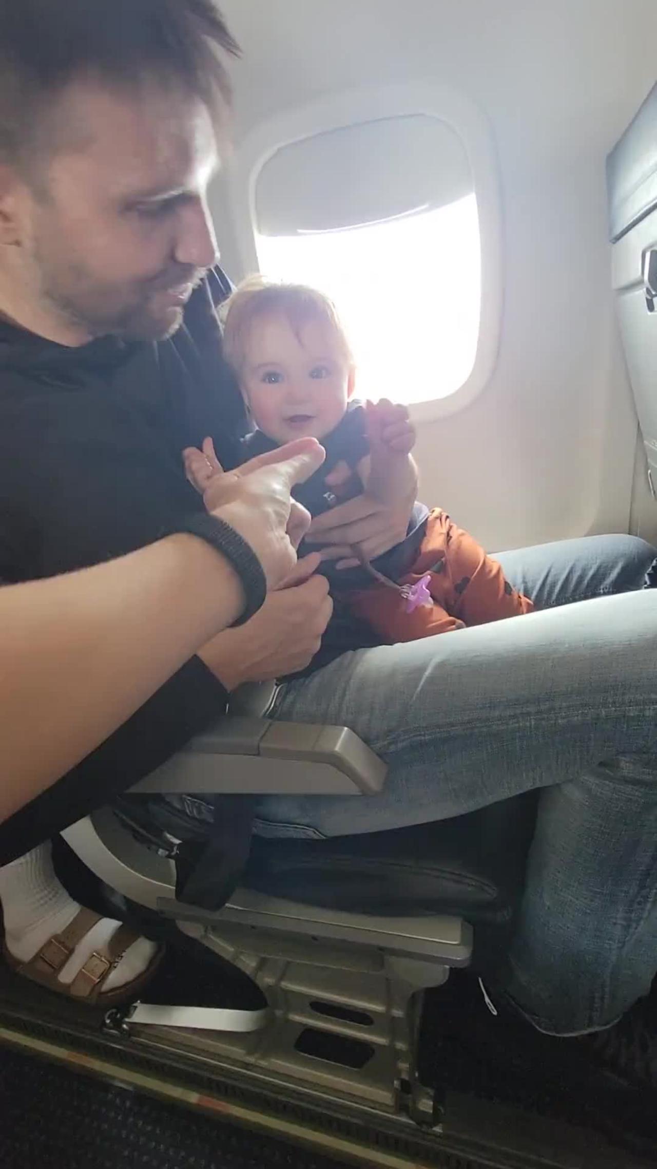 Hungry baby adorably steals dad's food