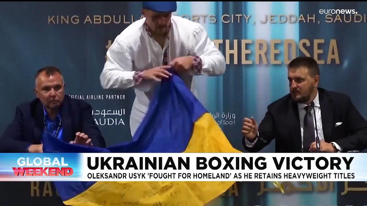 Ukrainian boxer Oleksandr Usyk devotes his world title win to war-torn homeland