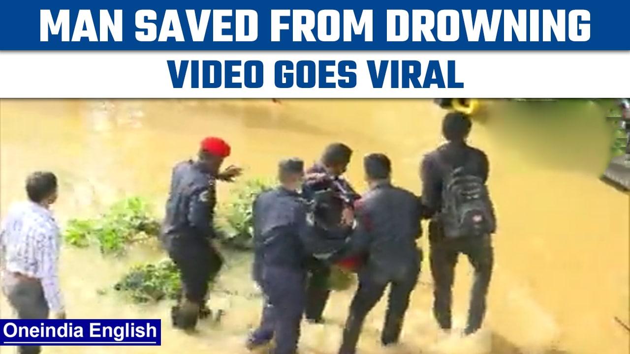 Bengaluru Rain: Drowning man rescued by security guards, video goes viral | Oneindia News *News