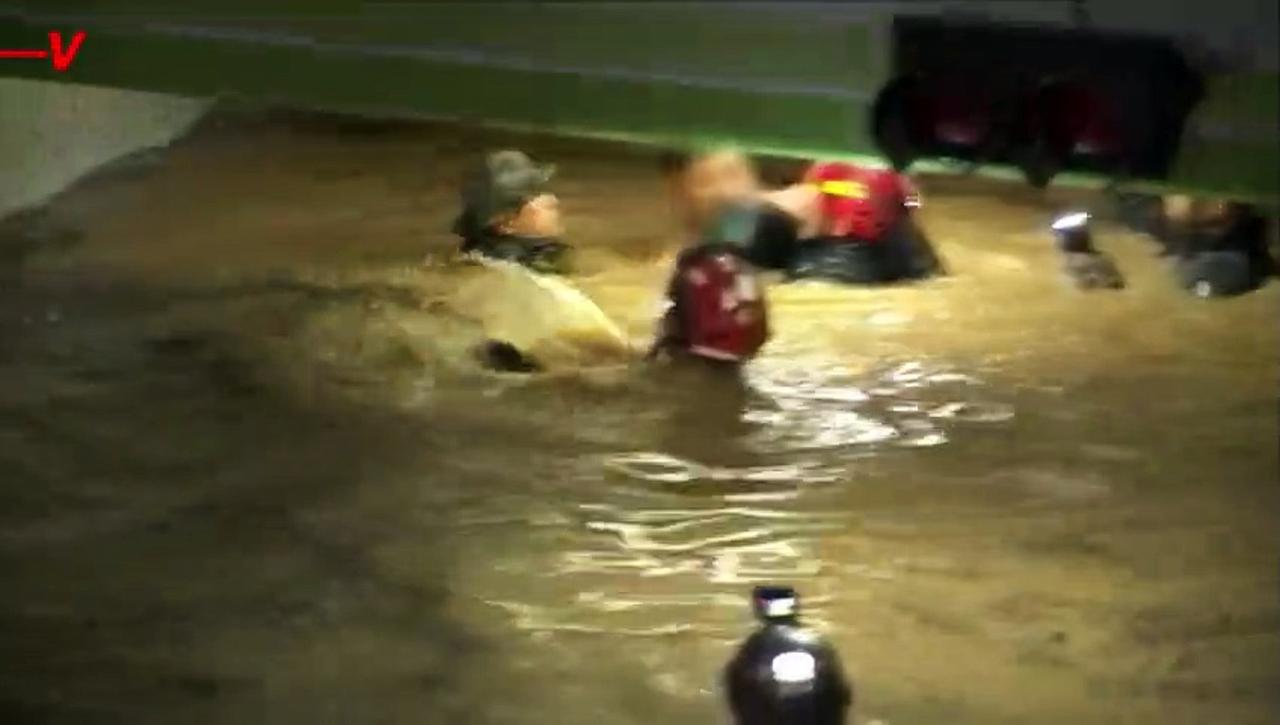 Rescuers Dramatically Save Two Victims From Flooded Car Park In Typhoon-Hit South Korea