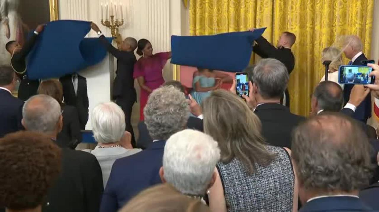 Obamas unveil their portraits at the White House.