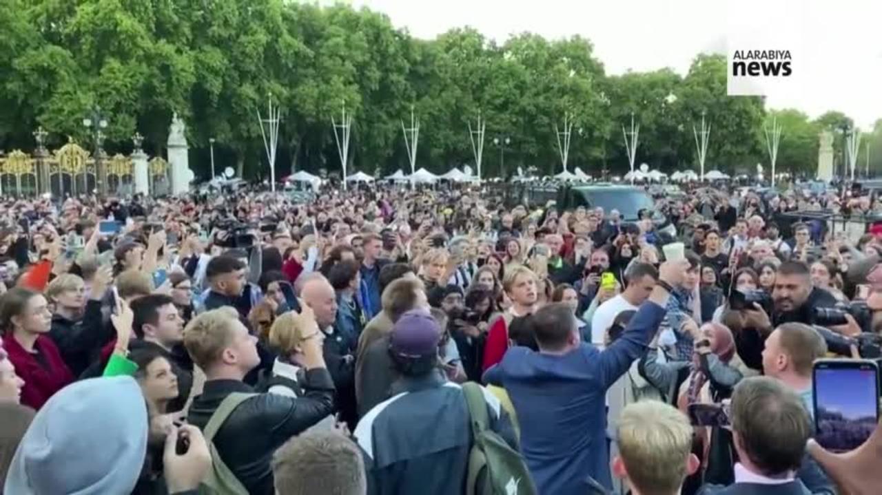 Crowd Gathers Outside Buckingham Palace, Sings "God Save The Queen"