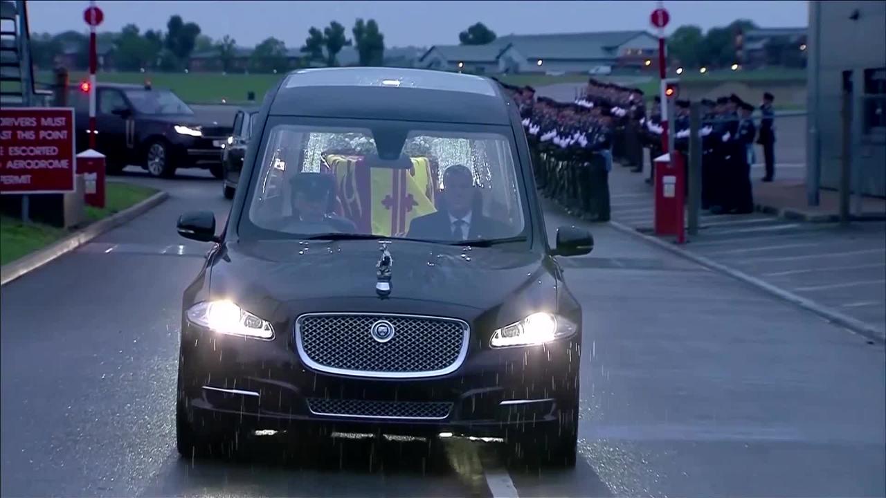 Queen Elizabeth's coffin arrives in London