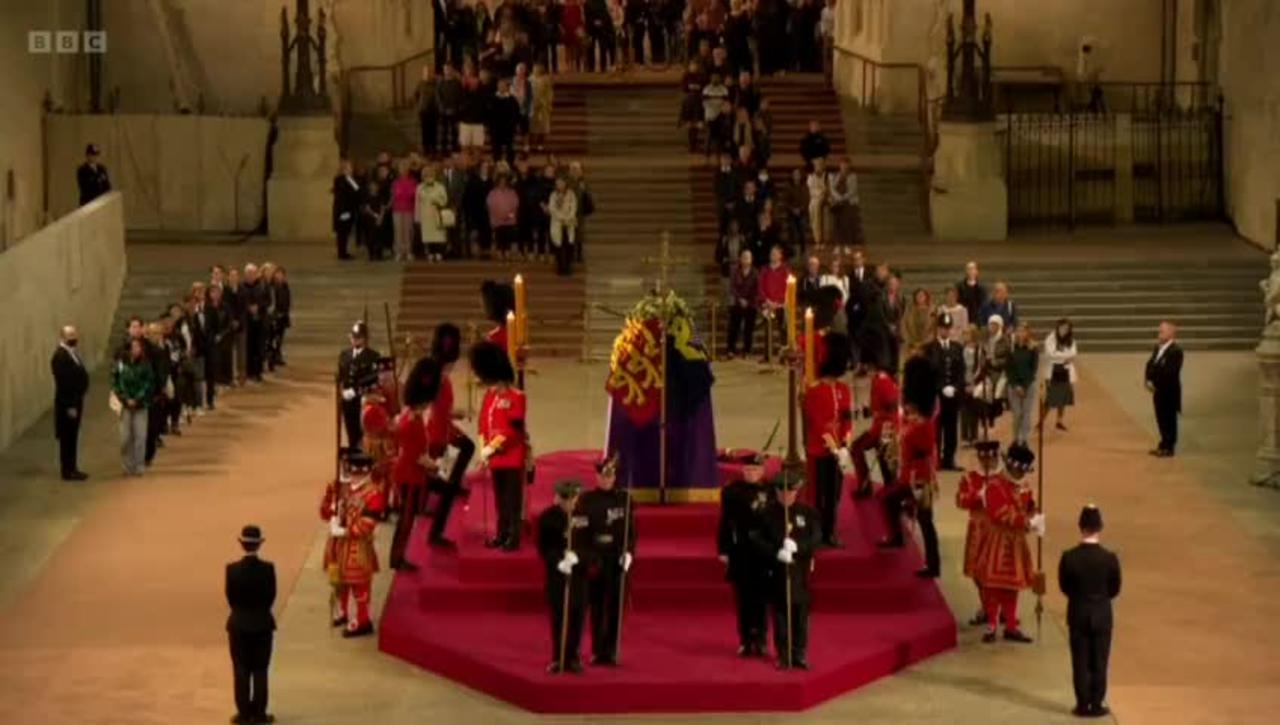 Royal guard at the Queen's coffin has collapsed.