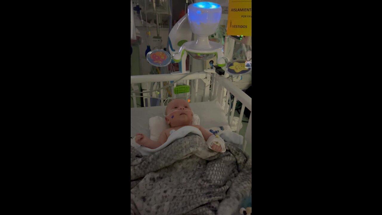 Baby watches mobile while recovering at Children's Hospital!.MOV