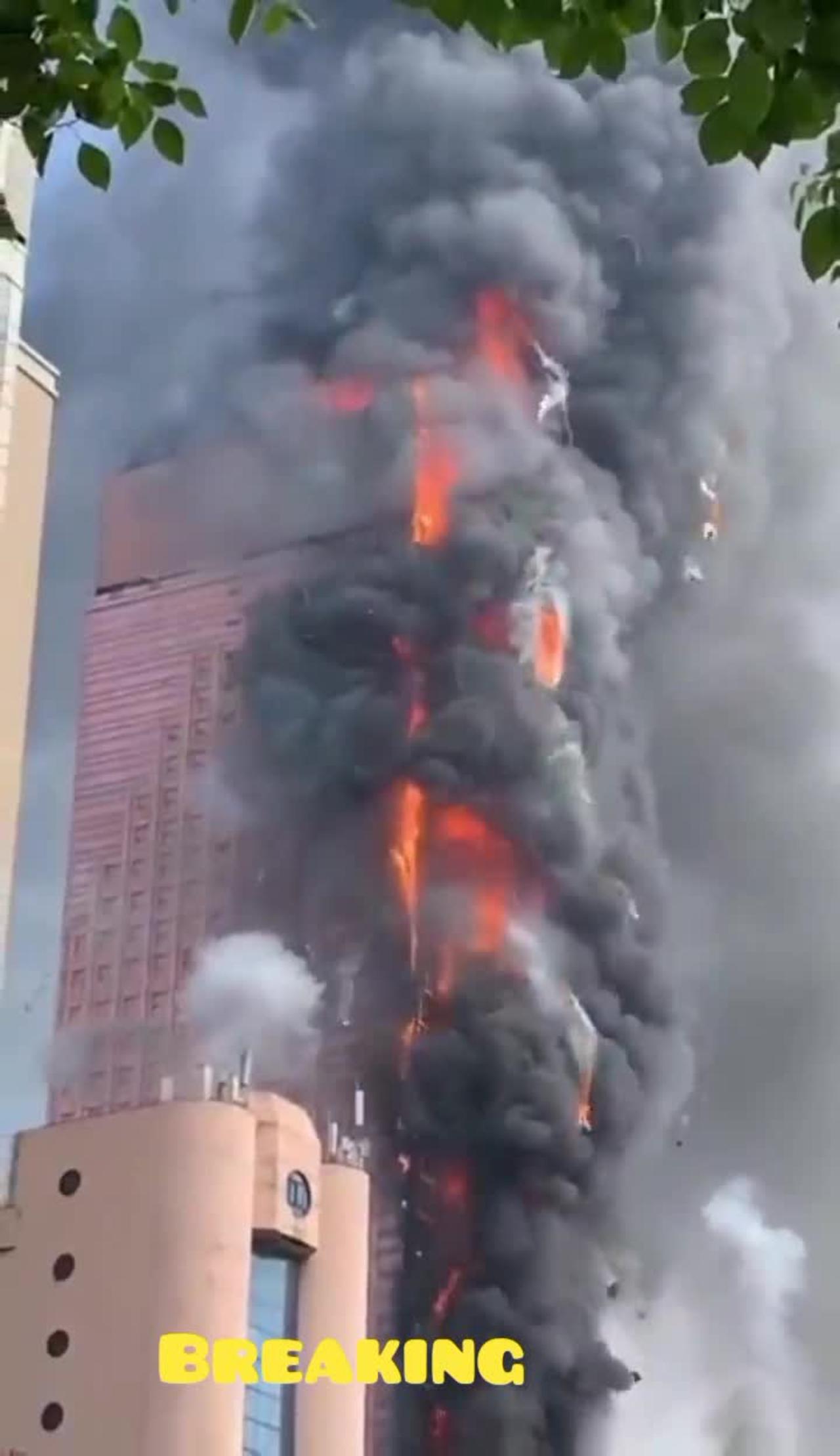 Massive fire engulfs skyscraper in China's Changsha
