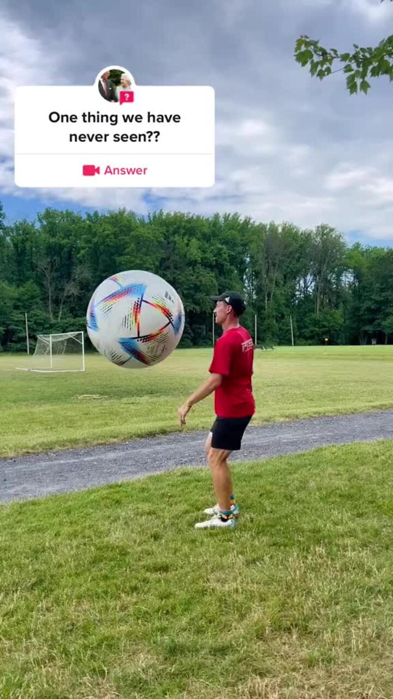 Person is juggling a jumbo soccer ball!.MOV