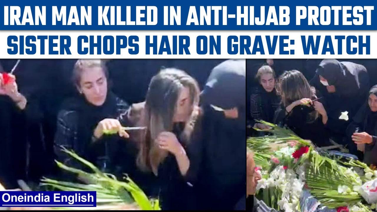 Iran: Sister of man killed in anti-hijab protest chops hair on grave | Watch | Oneindia News*News