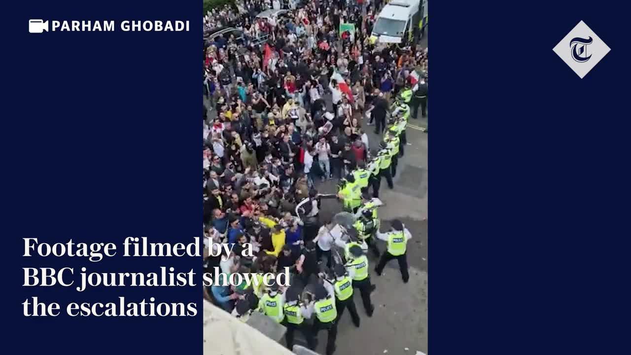 Dozens of protesters clash with police outside Iranian embassy in London