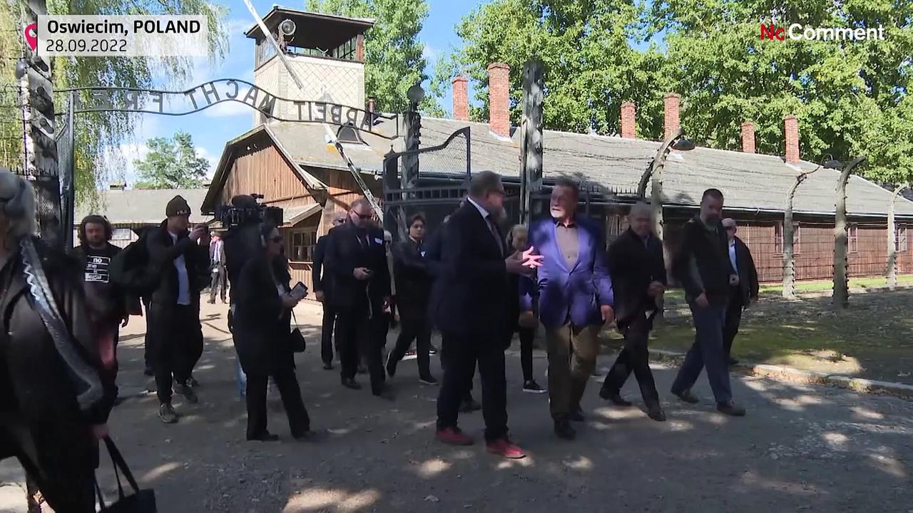 Arnold Schwarzenegger visits Auschwitz