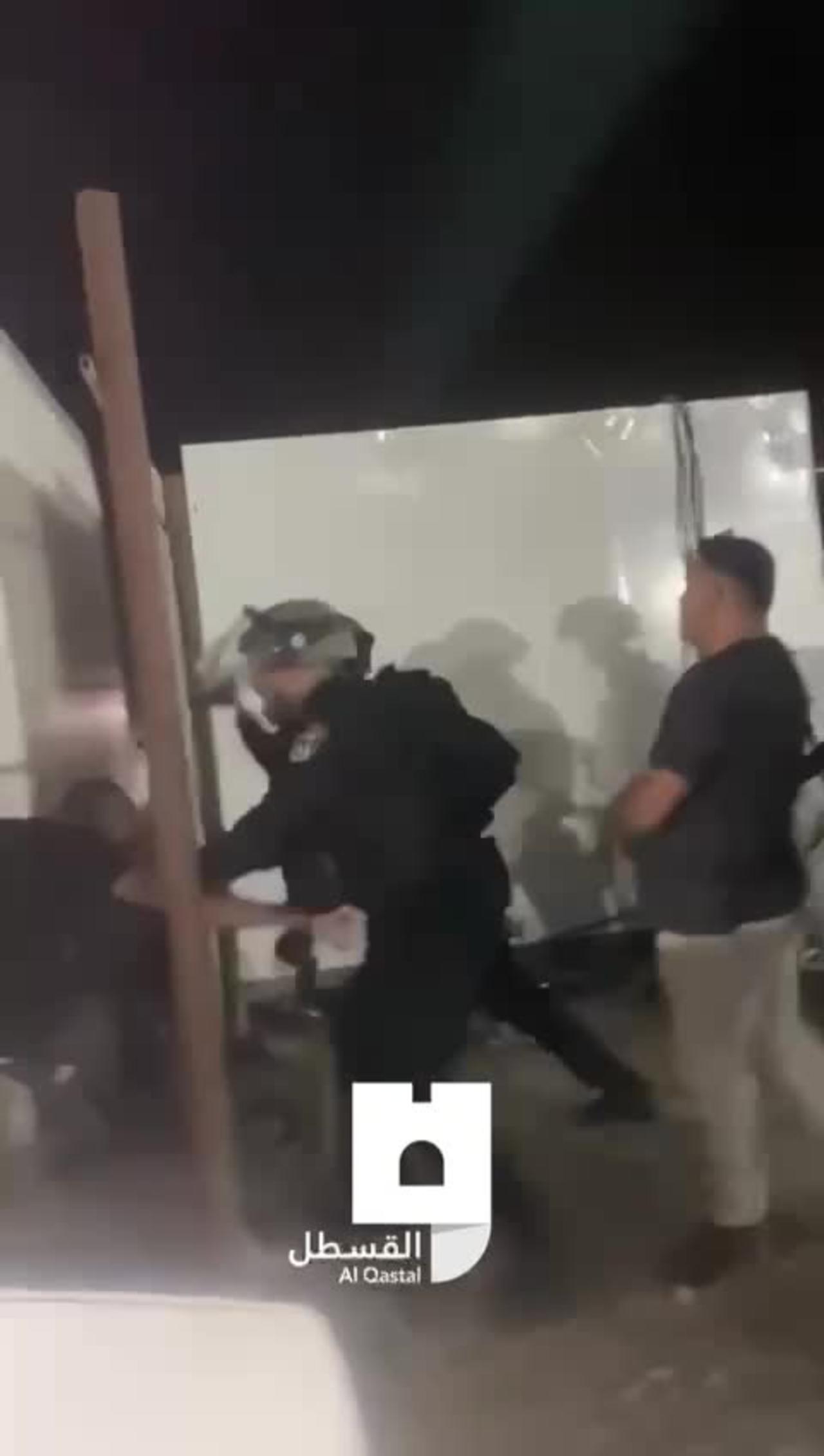Israeli cowards attacking a Palestinian boy...