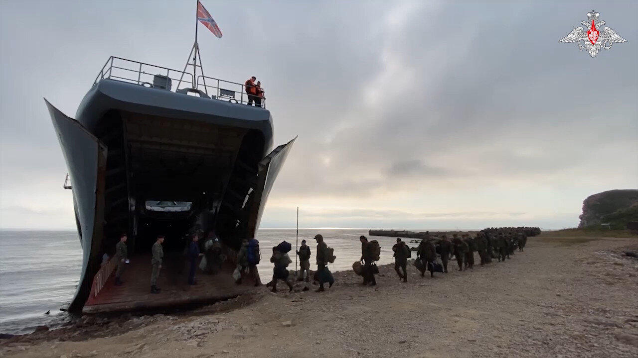 Mobilised servicemen travel by landing ship to Pacific Fleet training grounds