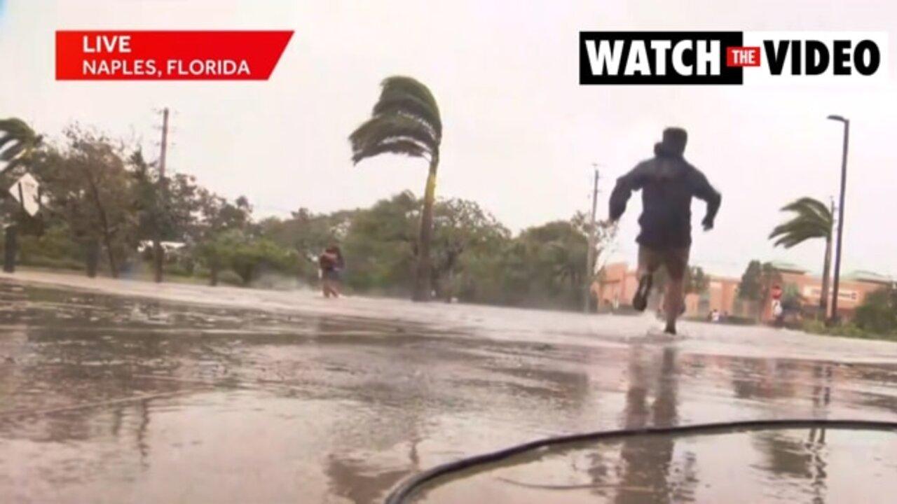 Cameraman Drops Camera to Run to Help People Fleeing Hurricane Ian