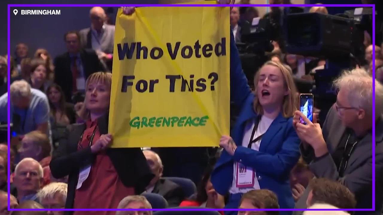 Watch Greenpeace protesters interrupt Liz Truss speech
