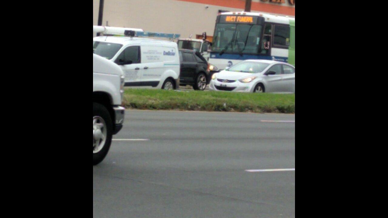 MTA New York city transit buses on long island ny route 25 on way to funeral
