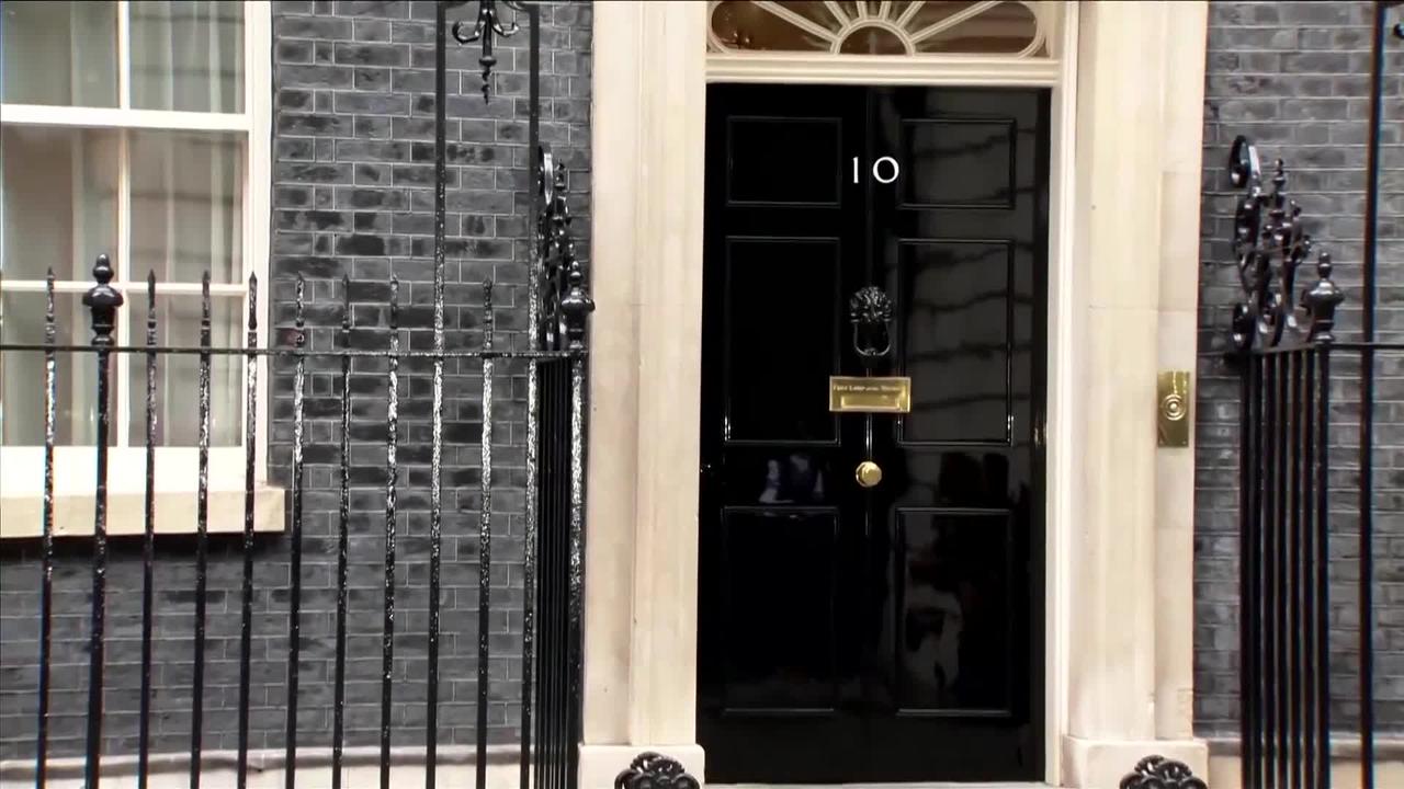 New UK finance minister Hunt arrives at Downing Street