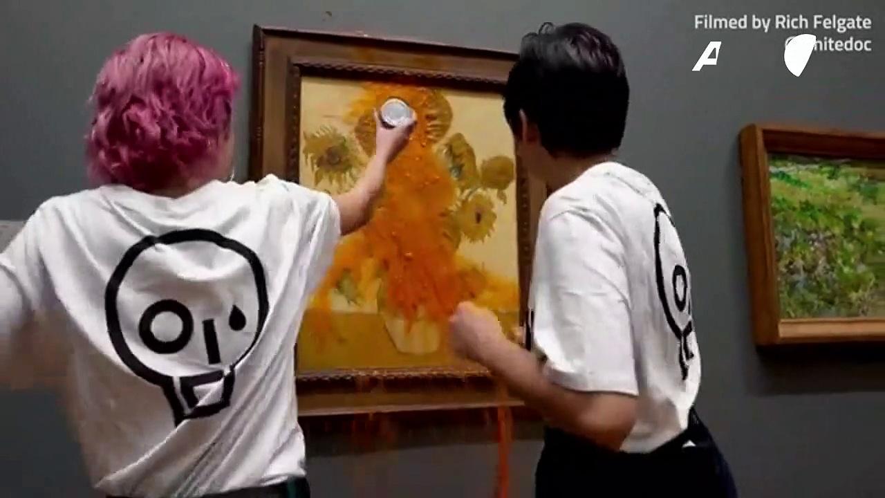Just Stop Oil protesters throw soup at Van Gogh's Sunflowers painting