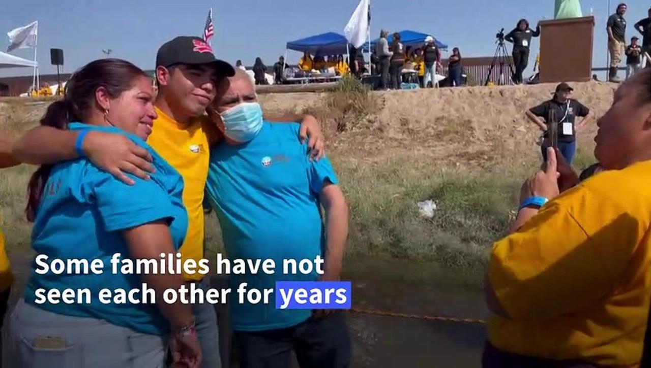 Migrant families briefly reunite under 'Hugs not walls' program at Mexico-US border