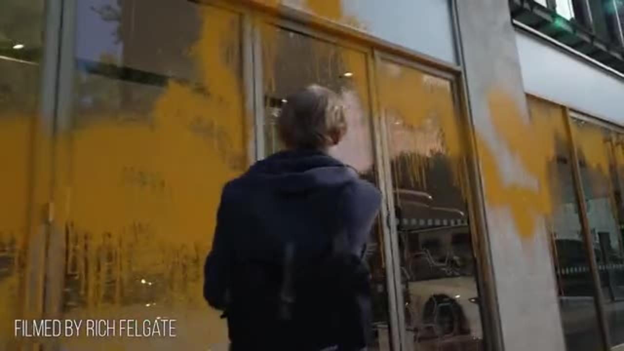 London UK Activists From 'Just Stop Oil' Have Sprayed Orange Paint Over an Aston Martin Car Showroom