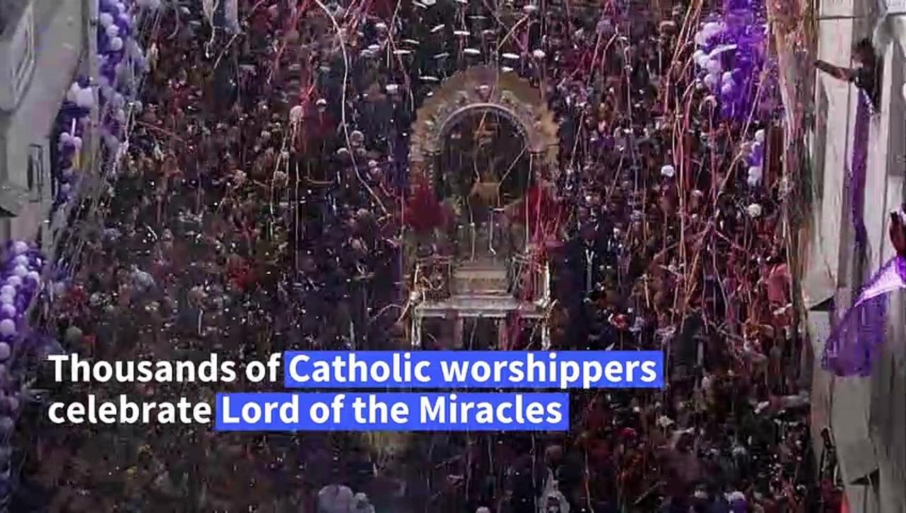Peruvians walk in Lord of the Miracles procession after two-year hiatus