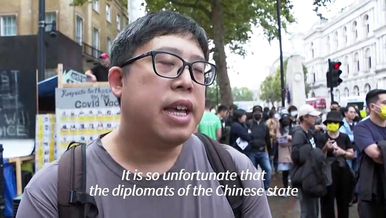 Protesters march in London against pro-democracy activist's assault at Chinese consulate