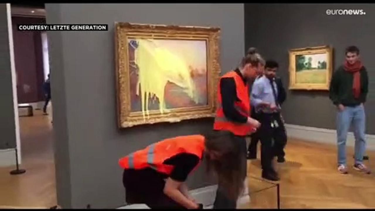 German climate activists throw mashed potatoes on Monet painting