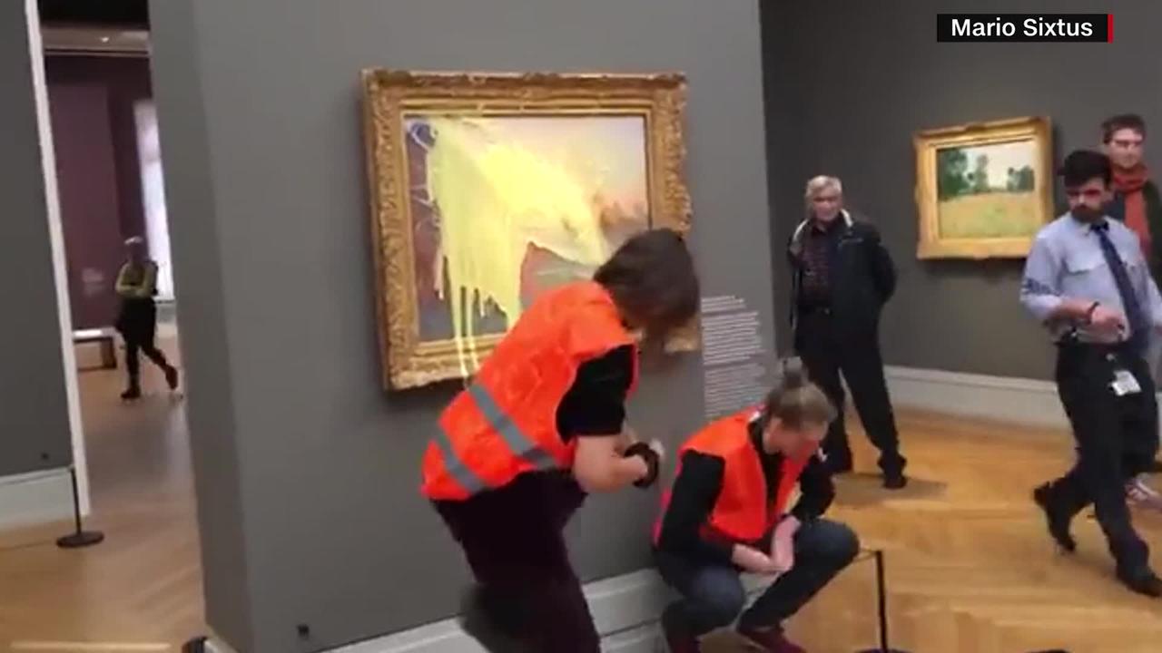Climate-change protesters pelt Monet painting with mashed potatoes at German museum