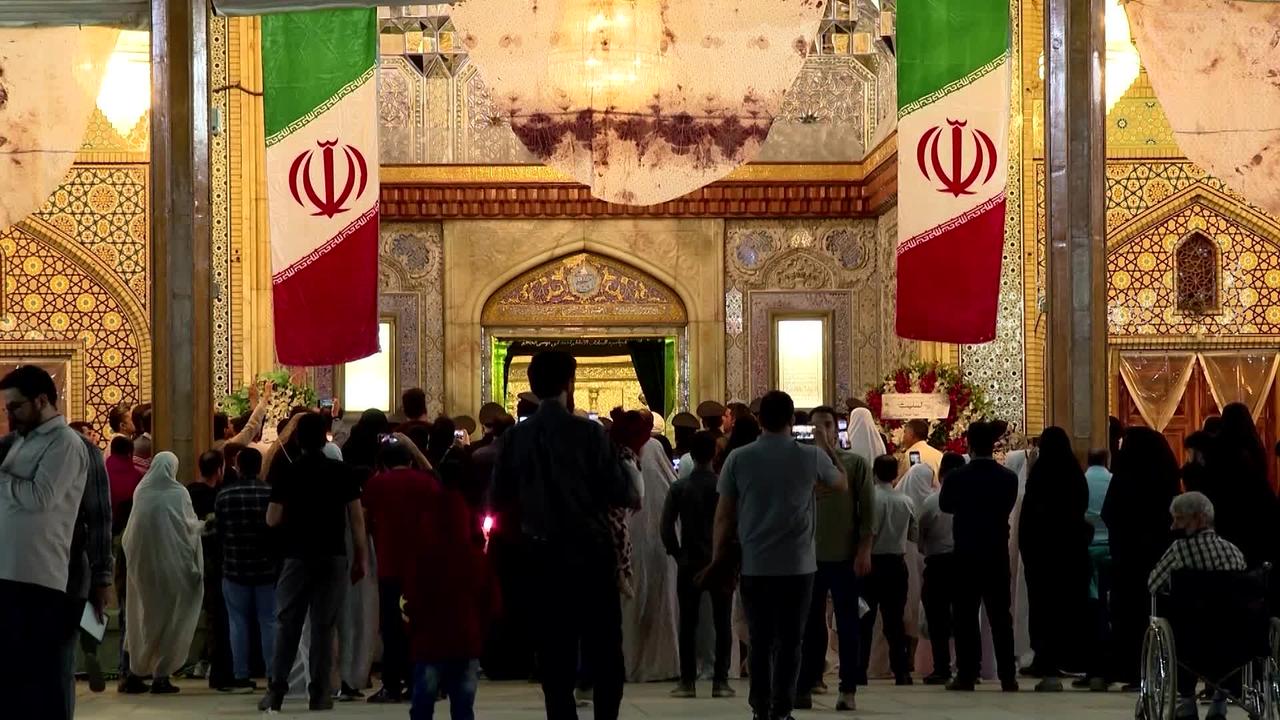 Relatives mourn family killed in Iran shrine attack
