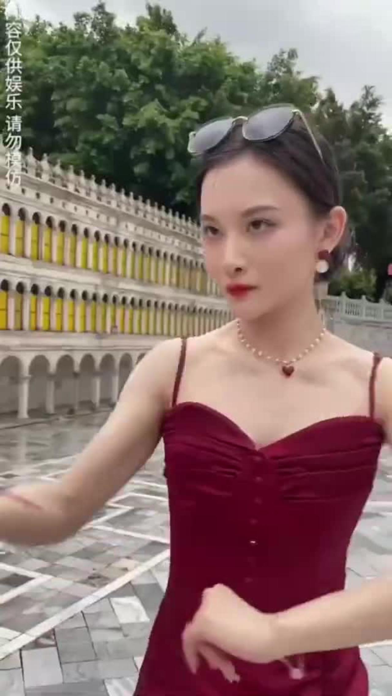 Chinese Woman in Red Dress Dodging Bat Full Video.