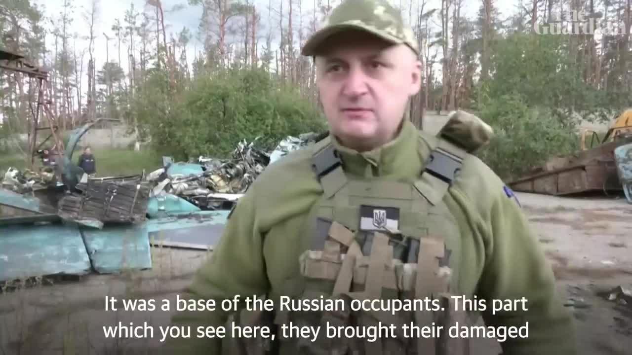 Burned out military vehicles and shredded uniforms mark Russia's retreat of Lyman