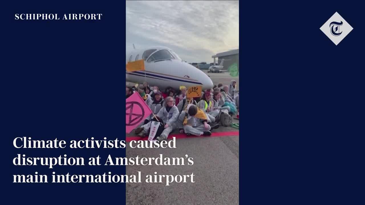 Climate activists block private jet take-offs at Amsterdam's Schiphol Airport